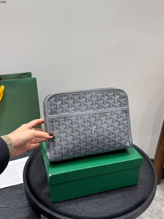 Essensiell clutchveske for menn