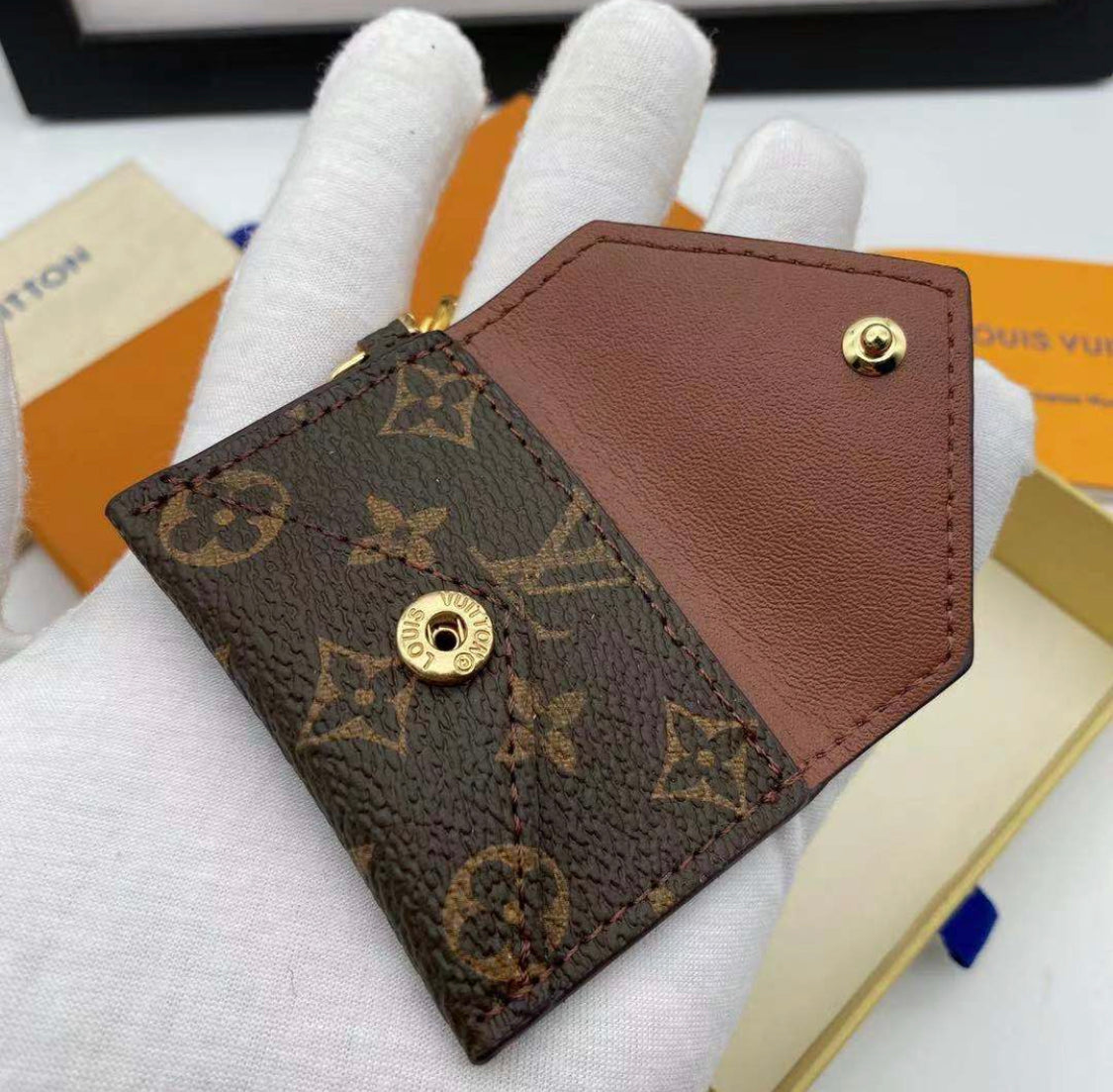 Πορτοφόλι σχεδιαστή μπρελόκ