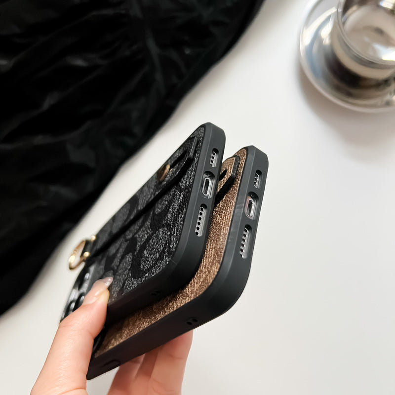 Coach iPhone -kotelo pidikkeellä Coffee-SW240330