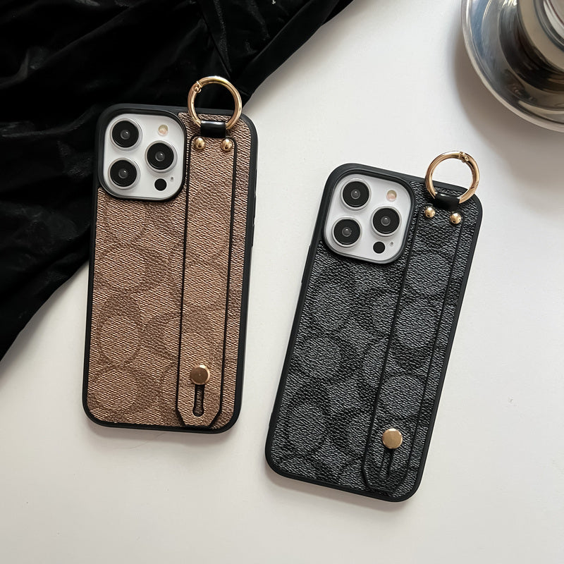 Coach iPhone -kotelo pidikkeellä Coffee-SW240330