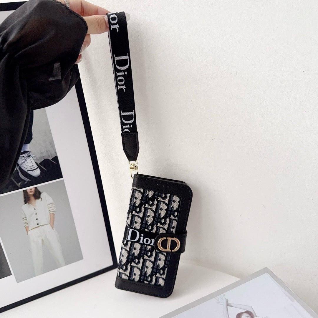 CD:n elegantti kuviollinen lompakkokotelo irrotettavalla rannehihnalla