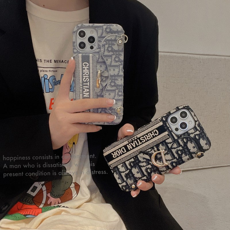 CD negro & Funda para iPhone tipo bandolera de tela gris con diseño de tarjetero