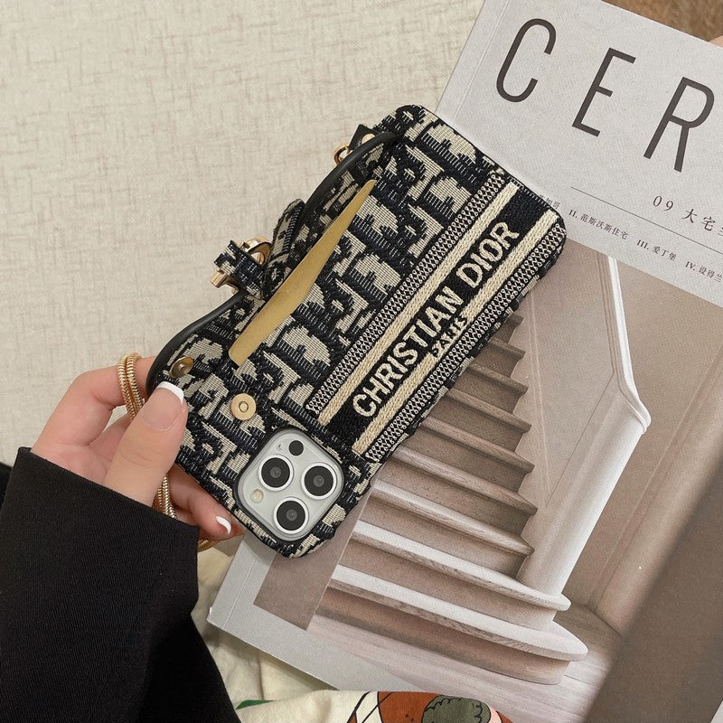 CD negro & Funda para iPhone tipo bandolera de tela gris con diseño de tarjetero