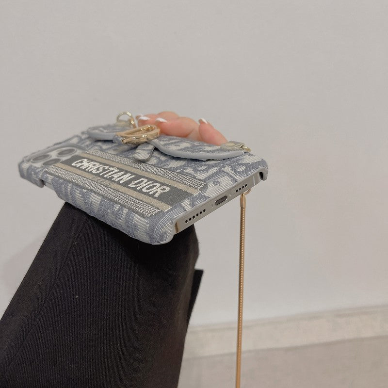 CD negro & Funda para iPhone tipo bandolera de tela gris con diseño de tarjetero