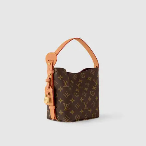 Best verkochte schoudertas met monogram